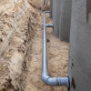 Onderlinge koppeling van drie regenwaterputten